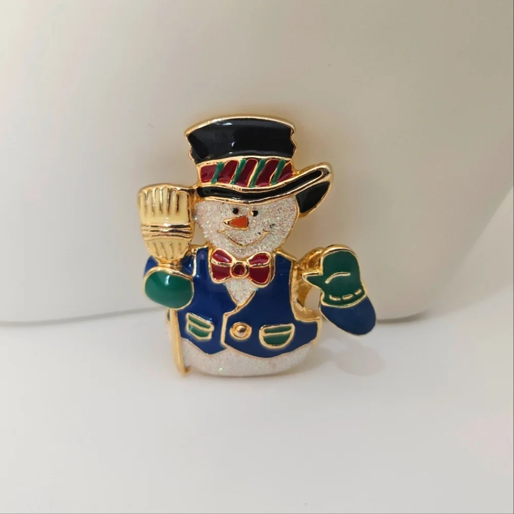 Snowman brooch/ pin sparkly, moving hand, gold toned, signed